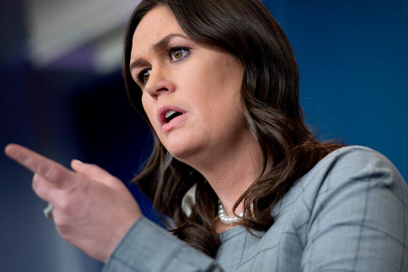 (FILES) This file photo taken on January 3, 2018 shows White House Press Secretary Sarah Sanders taking questions during the daily briefing at the White House in Washington, DC.
The White House announced January 4, 2018 that its staff and visitors will no longer be allowed to use personal cell phones in the West Wing, the nerve center of the American executive branch. The personal mobile phone ban will go into effect next week, White House press secretary Sarah Sanders said. She cited security reasons for the move but it comes amid an uproar over published comments about President Donald Trump and his family by former top White House strategist Steve Bannon."The security and integrity of the technology systems at the White House is a top priority for the Trump administration," Sanders said.
 / AFP PHOTO / JIM WATSON