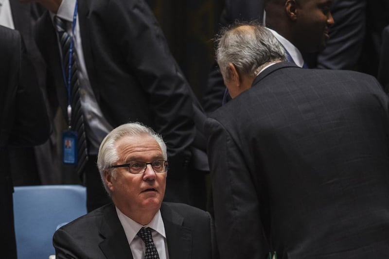 Syria’s UN Ambassador Bashar Jaafari, right, speaks to Russia’s UN ambassador Vitaly Churkin during a meeting of the United Nations Security Council on Thursday. Lucas Jackson / Reuters / May 22, 2014