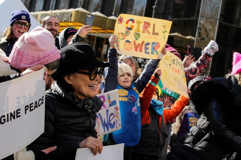 Artist Yoko Ono, left, takes part in the Women's March in Manhattan in New York City. Eduardo Munoz / Reuters