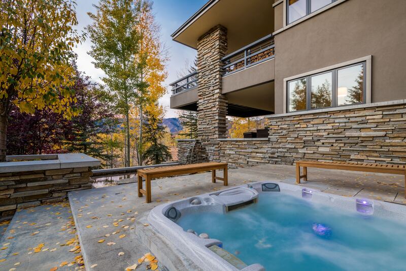 The property has an outdoor hot tub.