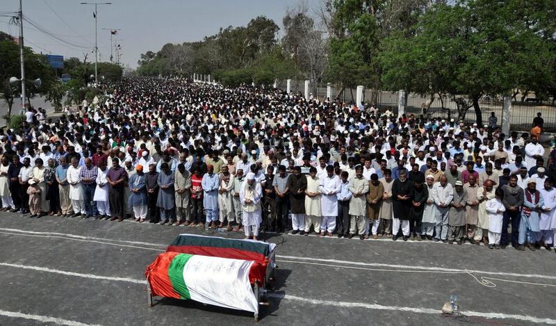 Supporters of secular party Mutahida Qaumi Movement (MQM) attend the funeral prayer of their workers, in Karachi, Pakistan. Shahzabid Akber / EPA / May 2, 2014  