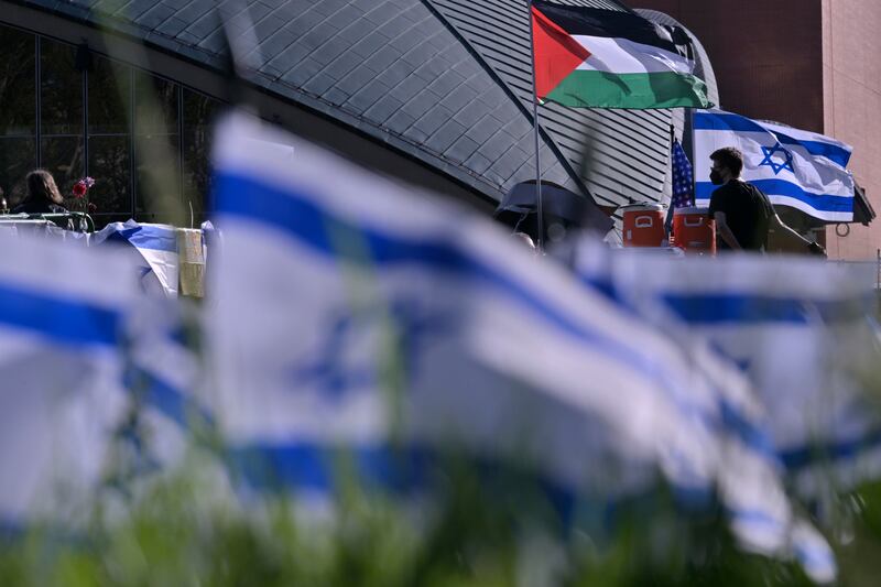 Israeli flags surround a pro-Palestine protest camp at the MIT campus in Massachusetts. Americans are divided over how to their country should respond to the Gaza war. AP