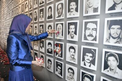 Maryam Rajavi, president-elect of the National Council of Resistance of Iran (NCRI) has called upon the U.N. to bring to justice those responsible for the massacre of 30,000 political prisoners in Iran during a visit to an exposition in Paris about these events. Jacques Boutaut, mayor of Paris' 2nd district, was also in attendance.  (Photo by Siavosh Hosseini/NurPhoto via Getty Images)