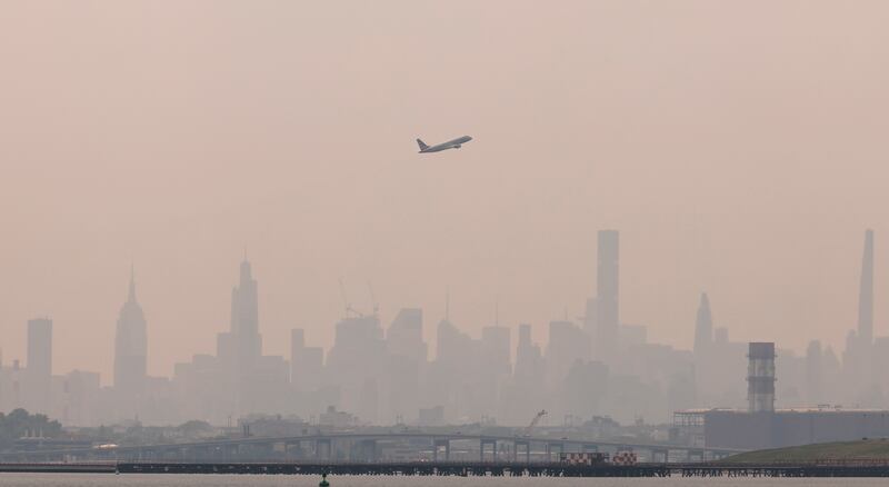 An aircraft is seen taking off from LaGuardia airport in New York City. In the US, the air ticket price index published by the St Louis Federal Reserve showed an 11 per cent increase in air ticket prices between April 2019 and April. EPA
