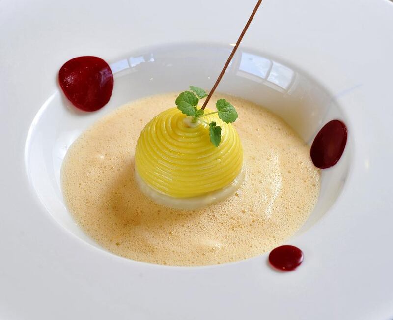 A starter with langoustine wrapped in steamed spaghetti, celery, rasberry vinegar and shellfish coulis created by the two Michelin-starred French chef , Philippe Etchebest. Charles Crowell for The National
