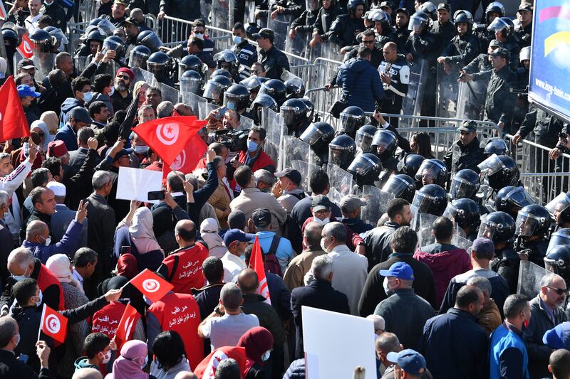Demonstrators protest against President Kais Saied’s consolidation of power in Tunis. The year 2022 will be a major turning point in Tunisia’s history – the year where it becomes clear whether the country’s experiment with democracy succeeds or fails. AFP
