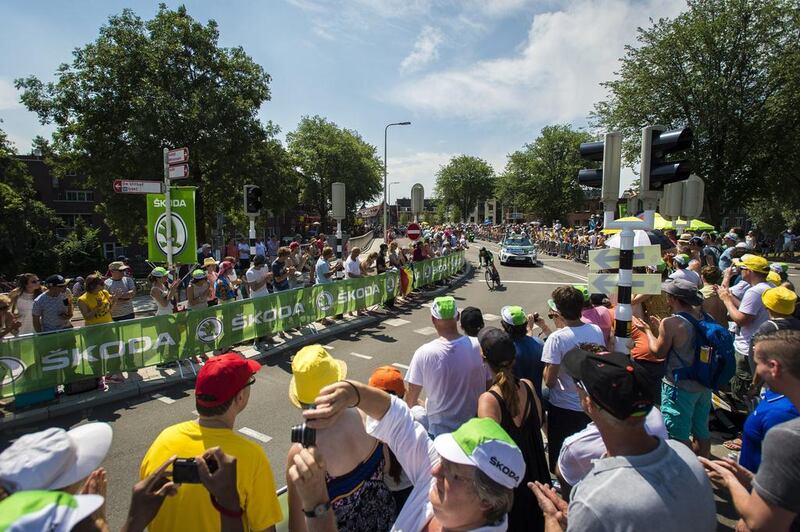 Spectators watch the opening time trial stage on the first day of the 2015 Tour de France on Saturday in Utrecht, Netherlands. Erik Van't Woud / AFP / ANP