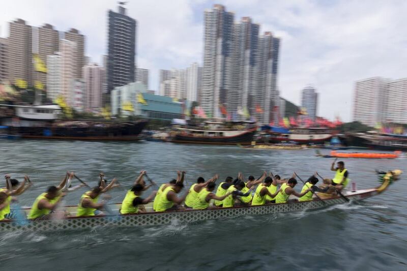 A dragon boat team races toward the finish line in Hong Kong.  Jerome Favre / EPA