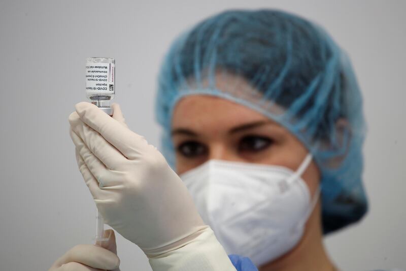 A nurse prepares a dose of AstraZeneca coronavirus disease (COVID-19) vaccine in Fasano Italy, April 13, 2021. REUTERS/Alessandro Garofalo REFILE - CORRECTING YEAR