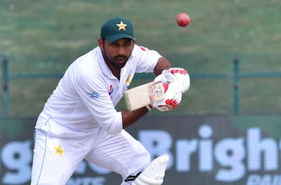 Pakistan cricketer Sarfraz Ahmed plays a shot during day three of the second Test cricket match in the series between Australia and Pakistan at the Abu Dhabi Cricket Stadium in Abu Dhabi on October 18, 2018. / AFP / GIUSEPPE CACACE
