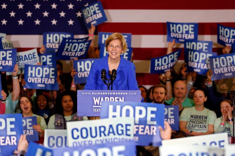 Democratic presidential candidate Elizabeth Warren speaks to supporters at a caucus night campaign rally in Des Moines, Iowa. AP Photo