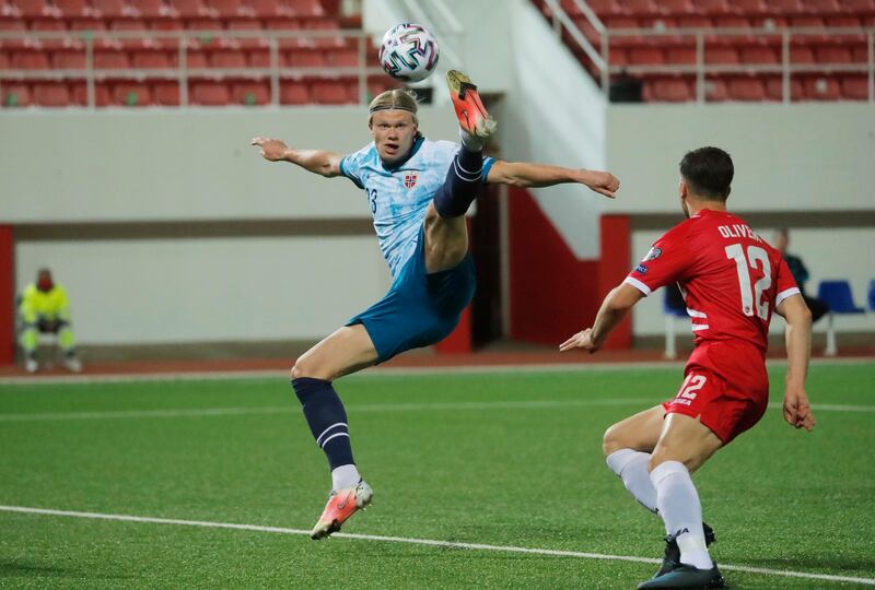 Norway's Erling Braut Haaland attempts to control the ball. Reuters