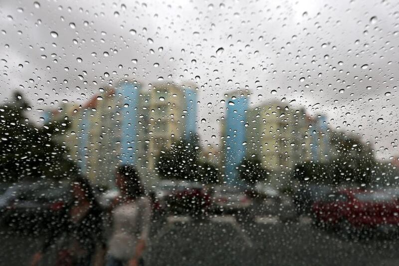 Rain in the morning at Discovery Gardens area in Dubai. Pawan Singh / The National 
