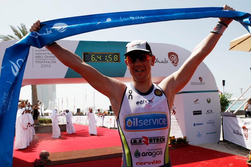 Abu Dhabi, United Arab Emirates, March 2, 2013:    Fredrick Van Lierde of Belgium celebrates racing to victory during the male long distance of the Abu Dhabi International Triathlon in Abu Dhabi on March 2, 2013. Christopher Pike / The National