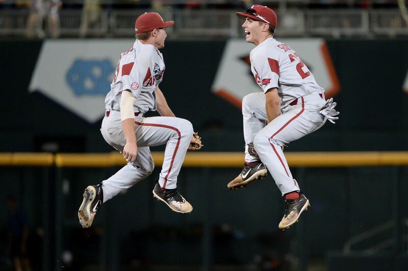 Arkansas Razorbacks shortstop Jax Biggers, left, and second baseman Carson Shaddy celebrate the win against the Oregon State Beavers in game one of the championship series of the College World Series at TD Ameritrade Park, in Nebraska, USA on June 26, 2018. Steven Branscombe / USA TODAY Sports / Reuters