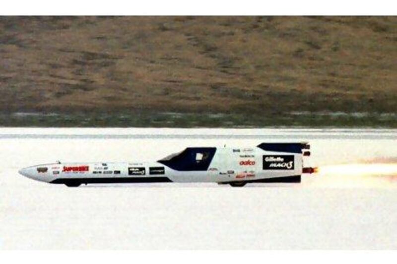 Richard Brown's tyre burst when he attempted to break the two-wheel land speed record in 1999, above. He'll be hoping for no repeat next year. Steve C