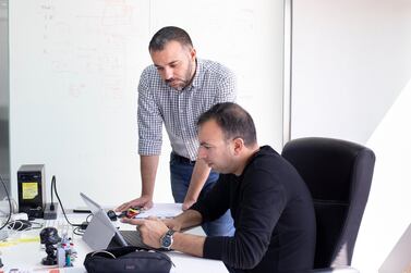 Ashraf Atia, right, chief commercial officer for Zbooni, and Ramy Assaf, right, co-founder and chief executive. The digital marketplace enables sales to be completed via messaging services such as WhatsApp. Reem Mohammed/The National