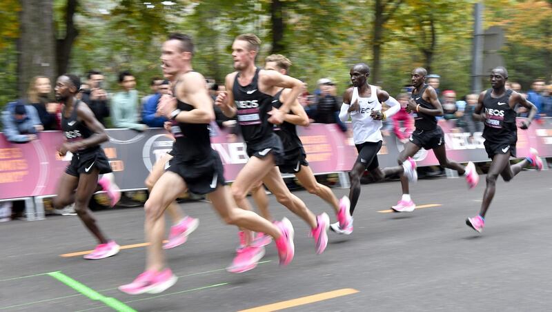 Kenya's Eliud Kipchoge (white jersey) runs during his attempt to bust the mythical two-hour barrier for the marathon in Vienna. Kipchoge holds the men's world record for the distance with a time of 2hr 01min 39sec, which he set in the flat Berlin marathon on September 16, 2018. He tried in May 2017 to break the two-hour barrier, running on the Monza National Autodrome racing circuit in Italy, failing narrowly in 2hr 00min 25sec. Austria.  AFP