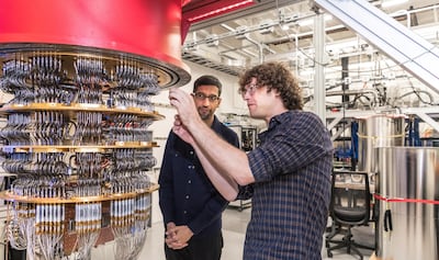 A handout picture from October 2019 shows Sundar Pichai and Daniel Sank (R) with one of Google's Quantum Computers in the Santa Barbara lab, California, U.S. Picture taken in October 2019.      Google/Handout via REUTERS        THIS IMAGE HAS BEEN SUPPLIED BY A THIRD PARTY.
