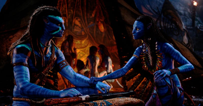 Jake Sully, performed by Sam Worthington, and Neytiri, performed by Zoe Saldana in a scene from Avatar: The Way of Water. Photo: 20th Century Studios 