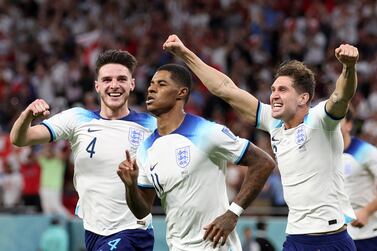 DOHA, QATAR - NOVEMBER 29: Marcus Rashford of England celebrates after scoring their team's first goal  during the FIFA World Cup Qatar 2022 Group B match between Wales and England at Ahmad Bin Ali Stadium on November 29, 2022 in Doha, Qatar. (Photo by Francois Nel / Getty Images)