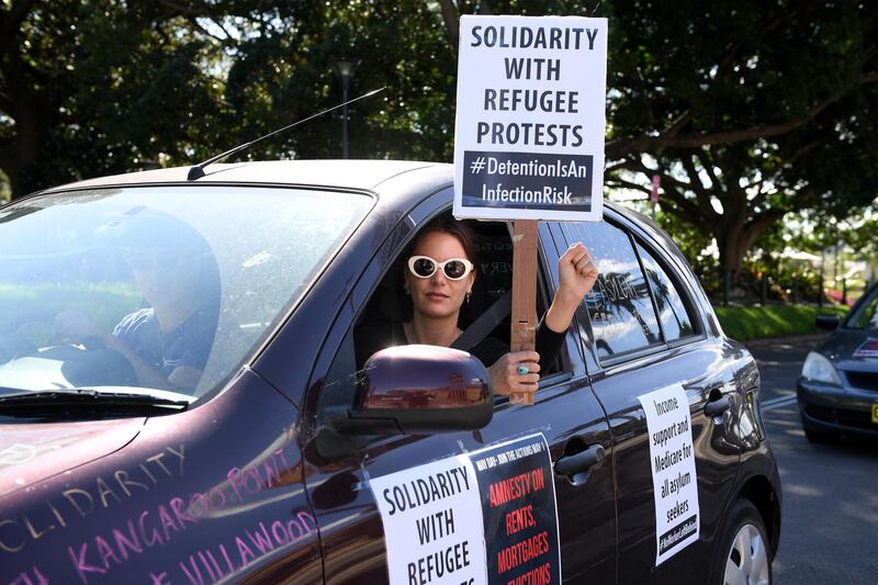 People take part in a May Day car convoy rally, to protest for workers rights during the coronavirus pandemic, in Sydney, Australia.  EPA