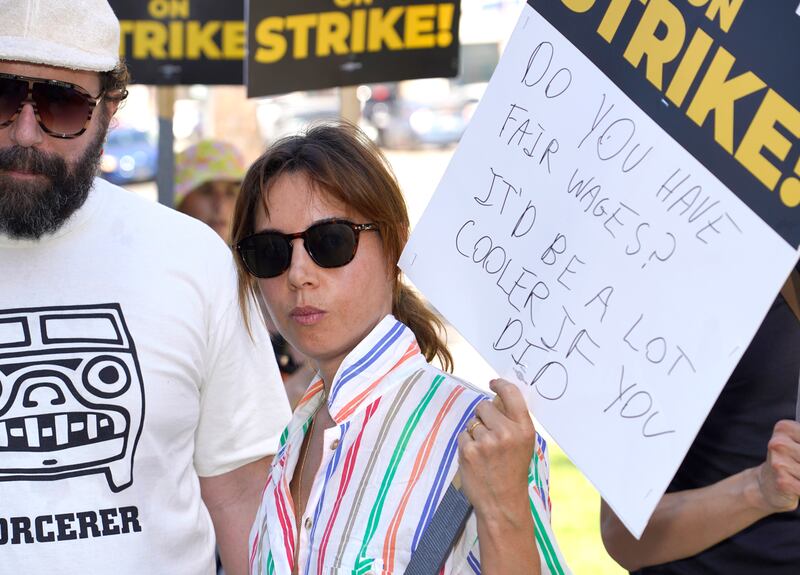Aubrey Plaza walks a picket line outside Netflix studios on July 20, 2023, in Los Angeles.  AP
