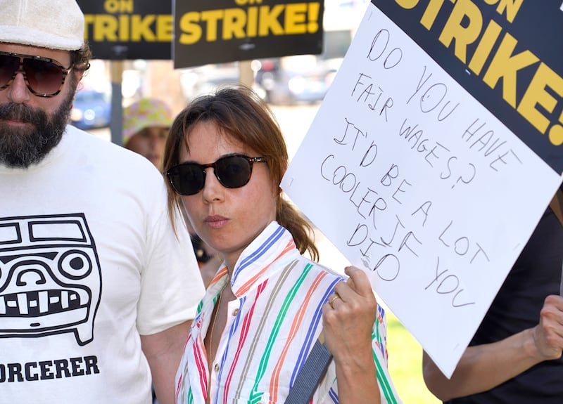 Aubrey Plaza protests outside Netflix studios in Los Angeles.  AP 