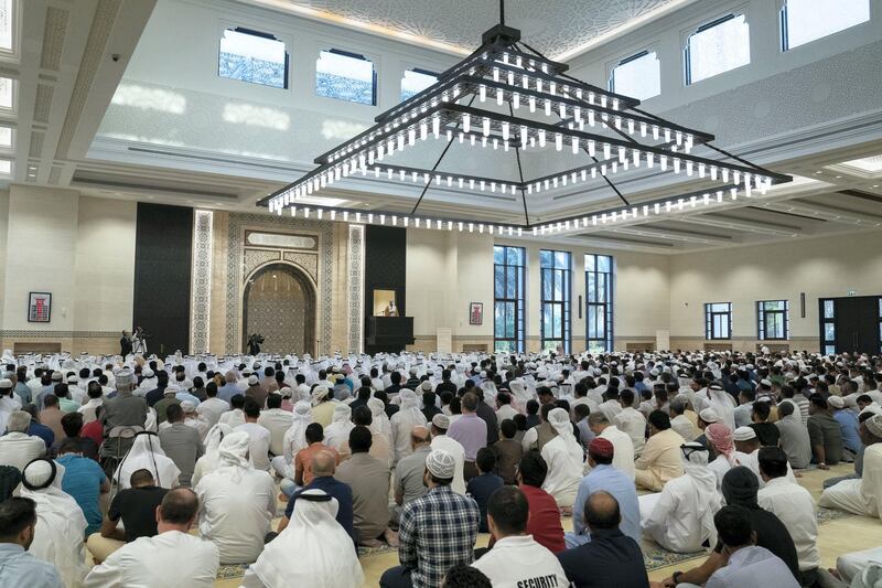 ABU DHABI, UNITED ARAB EMIRATES -June 04, 2019: HE Dr Mohamed Matar Salem bin Abid Al Kaabi, Chairman of the UAE General Authority of Islamic Affairs and Endowments (on platform), Imam at the Sultan bin Zayed The First mosque, delivers a sermon during Eid Al Fitr prayers.

( Hamad Al Mansouri / Ministry of Presidential Affairs )
---