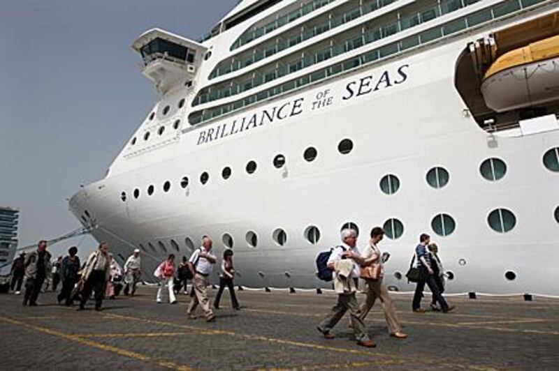 Passengers board Brilliance of the Seas at Port Rashid. The cruise liner sails from Dubai to Muscat, Fujairah, Abu Dhabi, Bahrain and returns to her starting point a week later.
