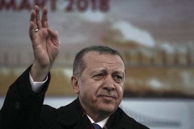 Recep Tayyip Erdogan, Turkey's president, waves to supporters during a ceremony for the first concrete casting of the "1915 Dardanelles Bridge" in Gelibolu area of the Dardanelles strait, Turkey, on Sunday, March 18, 2018. Saudi Arabia's Crown Prince Mohammed Bin Salman, talking to Egyptian newspaper editors earlier this month, accused Erdogan of trying to resurrect Ottoman claims to regional dominance - and reportedly labeled Turkey as part of a "triangle of evil." Photographer: Kostas Tsironis/Bloomberg