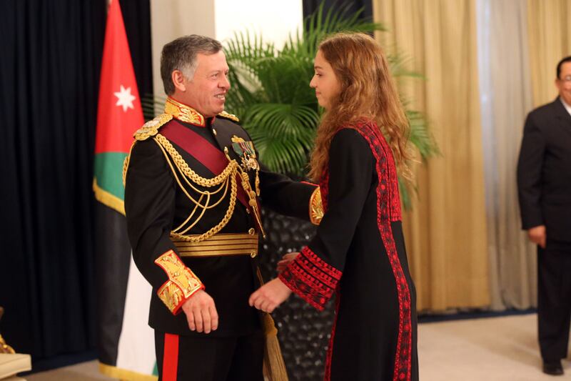 King Abdullah II is greeted by Princess Iman during the  throne opening ceremony of the first ordinary session of the 17th parliament in November 2013, in Amman. Getty Images