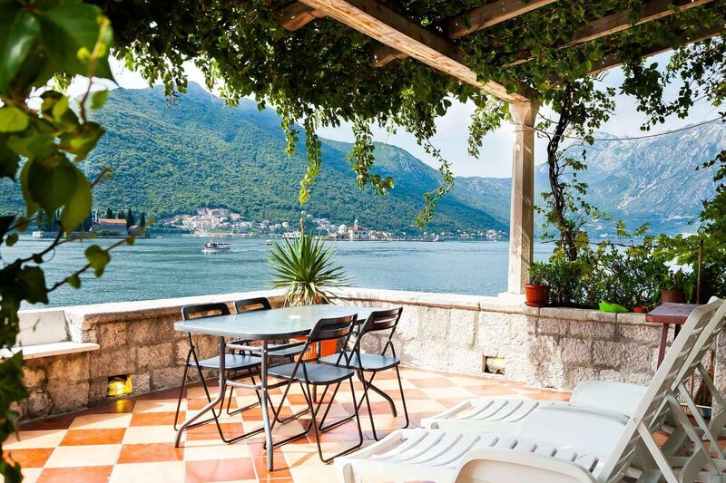 9. Waterfront home in Kotor, Montenegro, with a terrace that offers unobstructed views of two Bay of Kotor islands.
