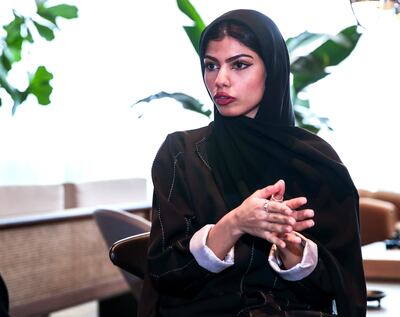 Alya Al Zaabi works at a jewellery store in Abu Dhabi and earns around Dh9,000 a month. Victor Besa / The National