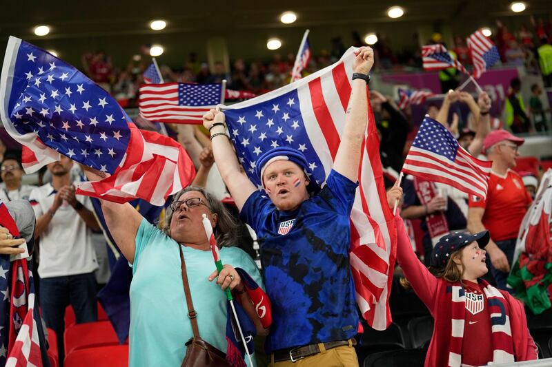 USA supporters cheer even though the match with Wales ended in a 1-1 draw. AP