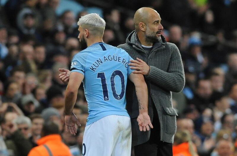 Pep Guardiola embraces Sergio Aguero as the Argentine forward is substituted. AP Photo