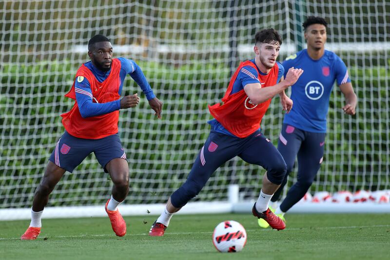 Fikayo Tomori runs with the ball during a training session at Tottenham Hotspur Training Centre.