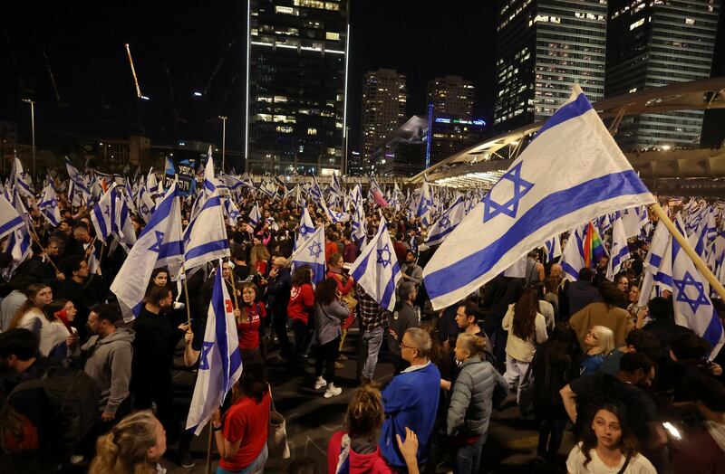 Protesters gather after Israeli Prime Minister Benjamin Netanyahu dismissed Defence Minister Yoav Gallant. Reuters