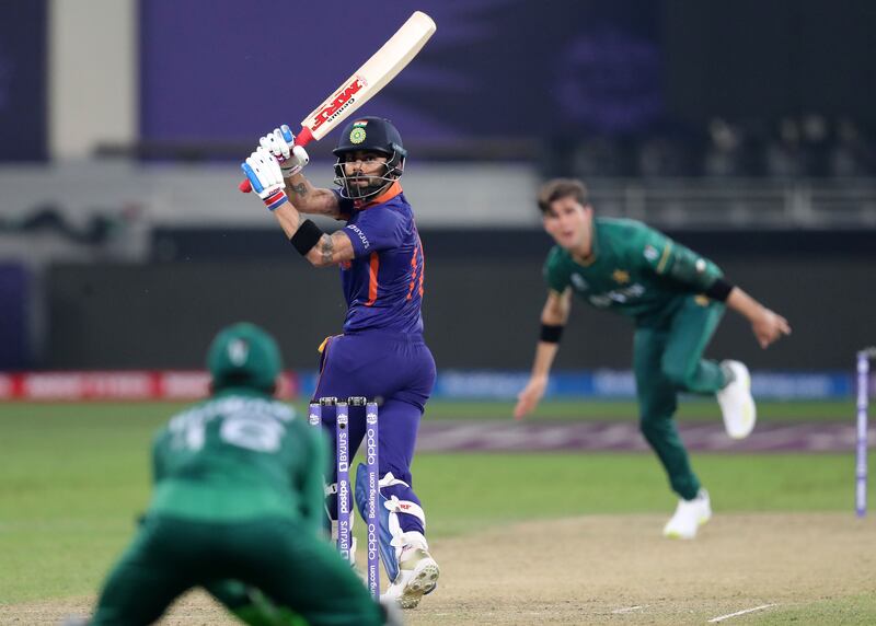 India's Virat Kohli is caught behind off the bowling of Pakistan's Shaheen Afridi as India take on Pakistan in the ICC men's T20 World Cup 2021 at Dubai International Cricket Stadium. Chris Whiteoak / The National