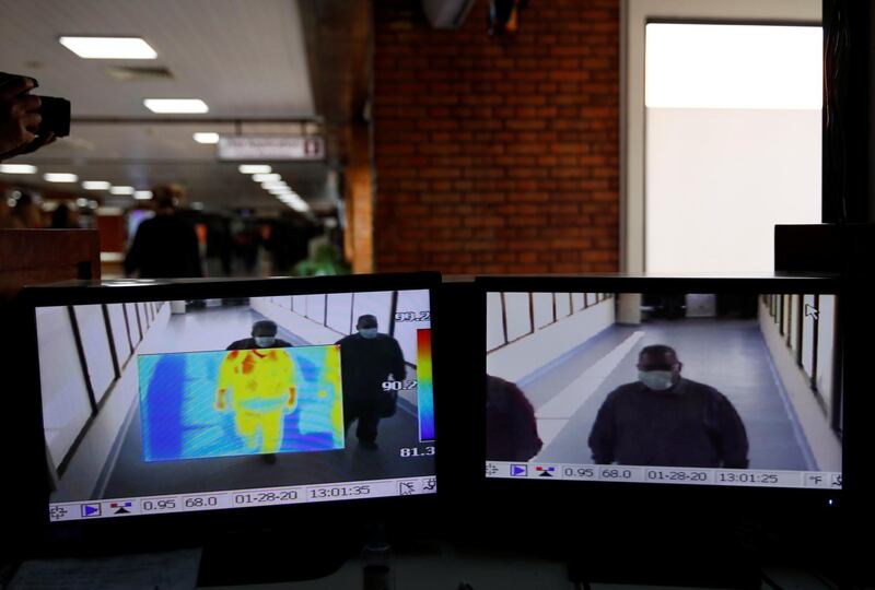 Passengers are seen on a thermal screen upon their arrival at the Tribhuvan International Airport after Nepal confirmed the first case of coronavirus in the country, in Kathmandu, Nepal. Reuters