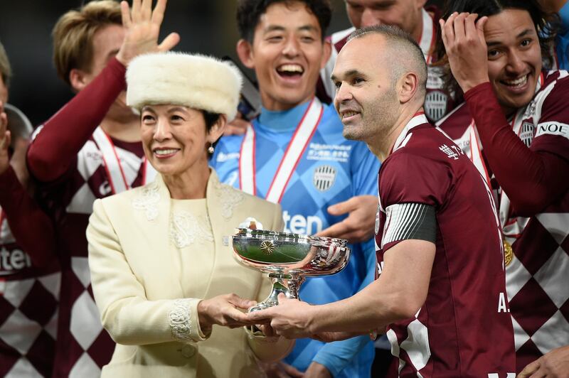 TOKYO, JAPAN - JANUARY 01:  Andres Iniesta #8 of Vissel Kobe poses with the winners trophy after the 99th Emperor's Cup final between Vissel Kobe and Kashima Antlers at the National Stadium on January 01, 2020 in Tokyo, Japan. (Photo by Matt Roberts/Getty Images)