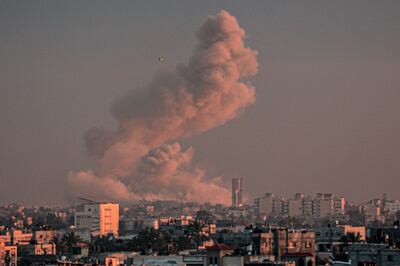 Smoke rising over buildings in Khan Yunis in the southern Gaza Strip on February 5 following an Israeli bombardment. AFP