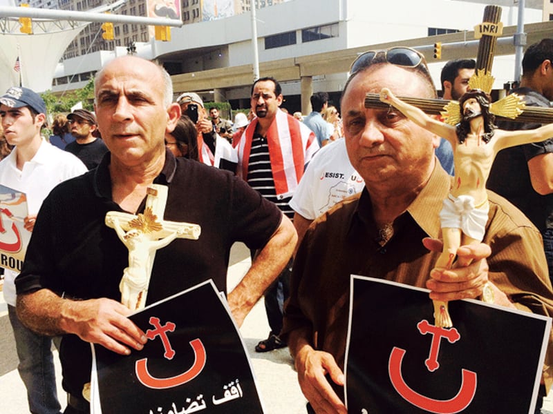 Iraqi Christians protest religious persecution in their homland during a 2014 rally in Metro Detroit.