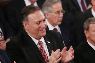 WASHINGTON, DC - FEBRUARY 04: Secretary of State Mike Pompeo applauds during the State of the Union address in the chamber of the U.S. House of Representatives on February 04, 2020 in Washington, DC. President Trump delivers his third State of the Union to the nation the night before the U.S. Senate is set to vote in his impeachment trial.   Mario Tama/Getty Images/AFP
== FOR NEWSPAPERS, INTERNET, TELCOS & TELEVISION USE ONLY ==

