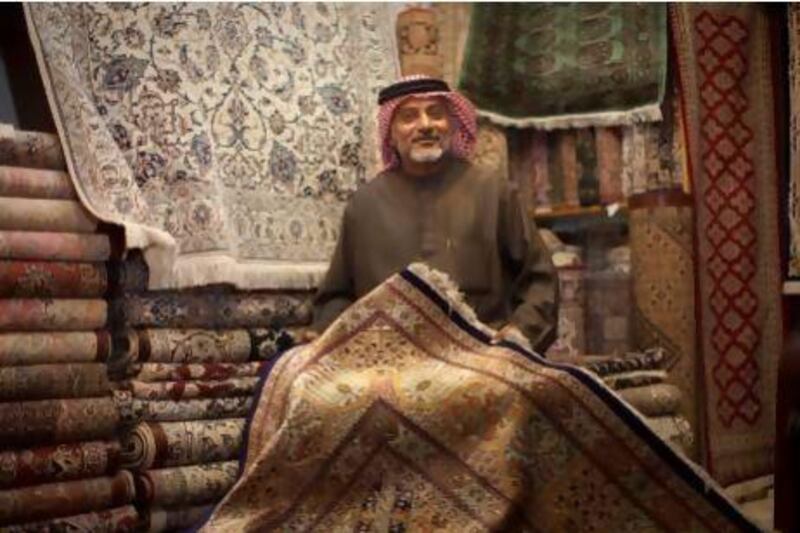 Abdul Hassan Qasim at his Iranian carpet shop in the Blue Souk.