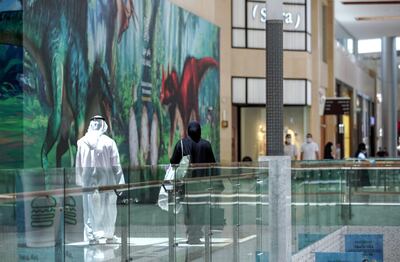 Abu Dhabi, United Arab Emirates, May 9, 2020.  Yas Mall, Abu Dhabi will be open from noon to 9pm. Supermarkets and pharmacies will be open from 9am to midnight.  Mall shoppers during the Coronavirus pandemic.
Victor Besa/The National
Section:  NA
Reporter: