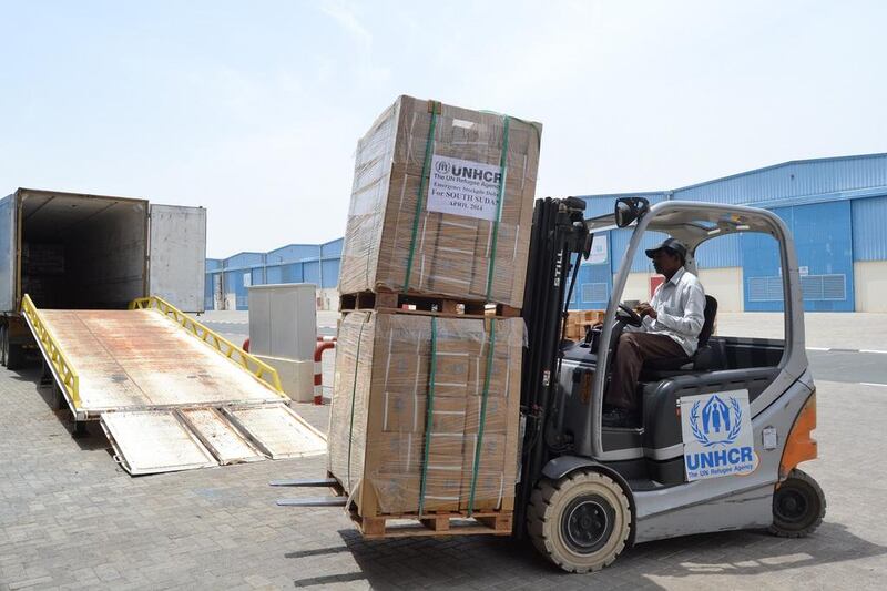 Humanitarian aid from the UNHCR stockpile in Dubai is loaded aboard containers to help displaced South Sudanese. Courtesy of UNHCR