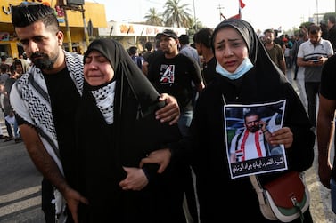 Mourners march in a funeral procession for Iraqi anti-government activist Ihab Al Wazni. AFP