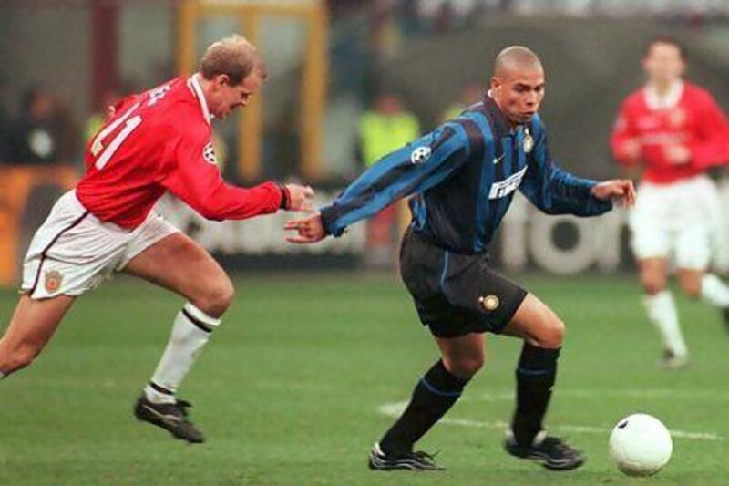 Inter Milan’s Ronaldo shows off his skills as he gets away from Manchester United’s Henning Berg in the Champions League in 1999.