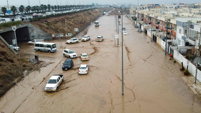 An aerial view of flooded streets in Arbil, the capital of Iraq's northern Kurdish autonomous region, after flash floods on January 13, 2022. AFP